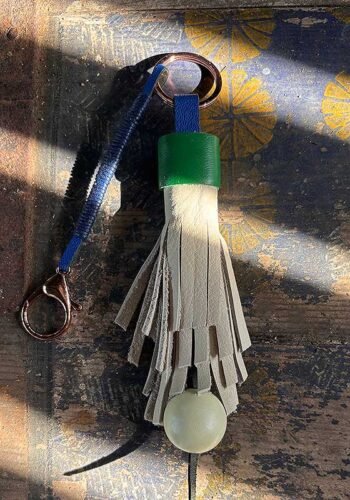 Pakabukas raktams Vanilės spalvos kutosais ir burbulu